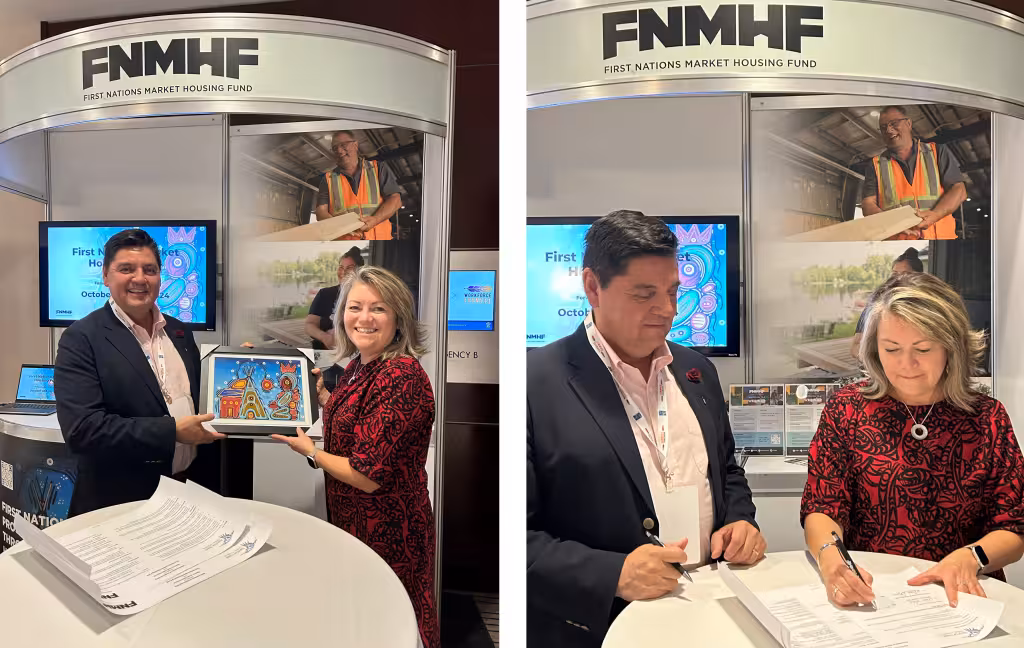 Two photos of Edith Moore and Travis Seymour at a First Nations Market Housing Fund booth, holding a painting and signing documents
