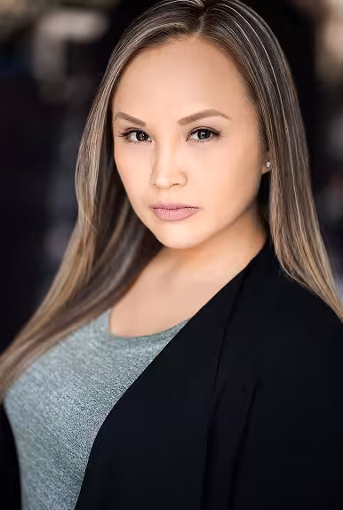 A professional headshot of Kayla Peters